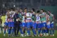 Paraguay's players celebrate their win over Brazil at the en