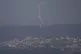 An Israeli army flare is seen over the Israeli-Lebanese bord