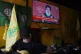 People watch the speech of Hezbollah leader Hassan Nasrallah