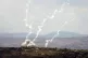 Smoke rises from Israeli airstrikes on Taybeh village, seen 
