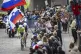 Gold medallist Slovenia's Tadej Pogacar (front) competes dur