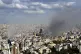 Smoke rises from neighbourhoods hit by Israeli airstrikes in