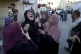 Palestinians mourn for relatives killed in the Israeli bomba
