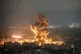 Flames and smoke rise from an Israeli airstrike in Dahiyeh, 