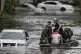 People are rescued from an apartment complex in the aftermat