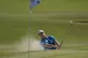 Taylor Pendrith hits out of a bunker on the 9th green during
