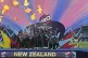 New Zealand's players pose with the trophy after winning the