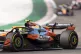 McLaren driver Lando Norris, of Britain, steers through a tu