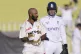 Pakistan's Sajid Khan (left) reacts after the ball hitting o