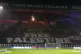 A giant banner reads 