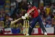 England's captain Jos Buttler plays a shot against West Indi