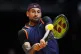Nick Kyrgios of Eagles returns the ball to Grigor Dimitrov o