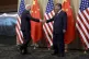 US President Joe Biden shakes hands with Chinese President X