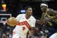 Toronto Raptors guard RJ Barrett (9) advances under pressure