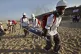 Medics from the Palestine Red Crescent Society and volunteer