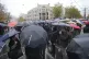 People stopping traffic and standing in silence to commemora