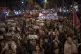 Demonstrators march to protest the skyrocketing cost of rent