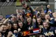 Red Bull driver Max Verstappen celebrates with teammates aft