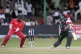Pakistan's, Kamran Ghulan (right) plays a stroke, in front o