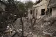 A member of the Israeli forces inspect a site following a ro