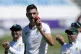 South Africa's Marco Jansen leaves the field as he holds the