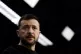 Ukraine's President Volodymyr Zelenskyy speaks to journalist