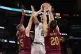 Boston Celtics center Kristaps Porzingis (8) is defended by 