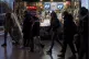 People walk by a newspaper stand after the Constitutional Co