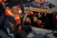 Migrants from Eritrea, Libya and Sudan crowd the hold of a w