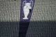  A security official walks past a Champions League trophy lo