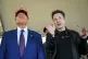 US President-elect Donald Trump listens to Elon Musk as he a