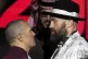 Boxer Tyson Fury (right) and Oleksandr Usyk (left) face off 