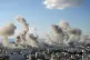 Smoke rises following an Israeli airstrike on Dahiyeh, in Be
