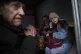Hanna, 12, and her family sit ride inside a van during an ev