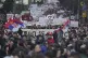 People attend a protest against the Serbian authorities in B