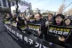 Protesters stage a rally demanding the arrest of impeached S