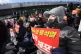 Protesters attend a rally demanding the arrest of impeached 