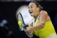 Aryna Sabalenka of Belarus plays a backhand return to Sloane
