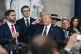 US President Donald Trump salutes as Melania Trump (third ri
