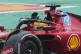 British driver Lewis Hamilton waves to fans as he steers a F