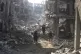 Palestinians who have returned inspect their houses, which w