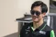 Kick Sauber driver Zhou Guanyu of China walks through paddoc
