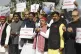India's opposition lawmakers, some of them wearing shackles,