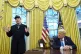 US President Donald Trump listens as far-right billionaire b