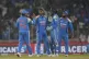 India's Axar Patel (second left) celebrates the wicket of En