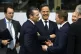 US Secretary of Defence Pete Hegseth (second left) speaks wi