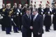 French President Emmanuel Macron (left) greets Britain's Pri