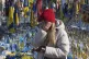 A woman cries at the memorial to the fallen Ukrainian soldie