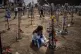 A woman grieves at a memorial for those killed and abducted 