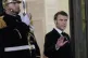 French President Emmanuel Macron gestures ahead of receiving